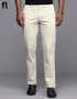 A pair of off white, solid patterned cotton pants with a smart fit designed for formal wear.